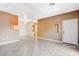 Open-concept living area with tile flooring and access to a bathroom and laundry at 4730 E Craig Rd # 1005, Las Vegas, NV 89115