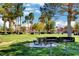 Community park featuring picnic tables, barbecue grills, and green space for outdoor activities at 4730 E Craig Rd # 1005, Las Vegas, NV 89115