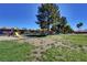 Outdoor recreational area featuring a playground with slides and picnic tables in a well-kept lawn at 4730 E Craig Rd # 1005, Las Vegas, NV 89115