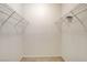 Empty walk in closet with two wire shelves and tiled floor at 4730 E Craig Rd # 1005, Las Vegas, NV 89115