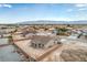 An aerial view focuses on an enclosed backyard with ample room for outdoor living and landscaping at 4801 Stoneham, Pahrump, NV 89061