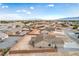 This aerial shot features a spacious fenced-in yard perfect for outdoor activities at 4801 Stoneham, Pahrump, NV 89061