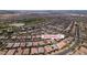 Aerial view of a residential community with the home's street address overlaid on the image at 489 Intonation St, Henderson, NV 89011