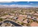 Scenic aerial shot of a residential neighborhood, highlighting the uniformity of homes and solar panels at 489 Intonation St, Henderson, NV 89011