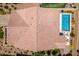 Aerial view of a roof, patio, pool, with some landscaping and backyard at 489 Intonation St, Henderson, NV 89011
