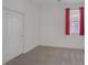 Bedroom with plush carpeting, natural light and a large closet, perfect for relaxing at 489 Intonation St, Henderson, NV 89011