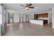 Spacious living area with plenty of natural light, tile flooring, and an open floor plan at 489 Intonation St, Henderson, NV 89011