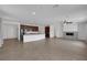 Open-concept living area featuring lots of space, tile floors, and fireplace at 489 Intonation St, Henderson, NV 89011
