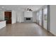 Large living room featuring a modern fireplace, tile floors, and an open layout at 489 Intonation St, Henderson, NV 89011