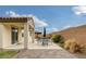 Wonderful patio with swimming pool, patio table set, covered area and brick privacy wall at 489 Intonation St, Henderson, NV 89011