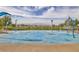 Vibrant splash pad with interactive water features, providing fun and cooling relief on a sunny day at 489 Intonation St, Henderson, NV 89011