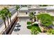 Aerial view of the home, featuring a well-maintained lawn and mature palm trees enhancing the property's curb appeal at 5015 Thunder River Cir, Las Vegas, NV 89148