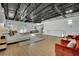 Spacious bedroom with modern decor, open ceilings, and comfortable seating at 5015 Thunder River Cir, Las Vegas, NV 89148