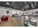 View of the bedroom with open ceilings, modern furniture, and stylish decor at 5015 Thunder River Cir, Las Vegas, NV 89148