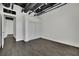 Spacious bedroom with dark floors, white walls, and closet with sliding doors at 5015 Thunder River Cir, Las Vegas, NV 89148