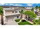 Stunning two-story home with a well-manicured lawn, mature landscaping, and a private two-car garage at 5015 Thunder River Cir, Las Vegas, NV 89148