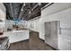 Modern kitchen boasts white cabinets, stainless steel appliances, and an open design at 5015 Thunder River Cir, Las Vegas, NV 89148