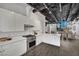 Modern kitchen boasts white cabinets, stainless steel appliances, and an open design at 5015 Thunder River Cir, Las Vegas, NV 89148