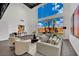 Bright living room features high ceilings and large windows with lots of natural light at 5015 Thunder River Cir, Las Vegas, NV 89148