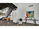 Stylish staircase with floating steps, modern artwork, and accent lighting at 5015 Thunder River Cir, Las Vegas, NV 89148