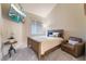 Cozy bedroom with comfy chair, television and neutral colors at 5058 Crooked Stick Way, Las Vegas, NV 89113