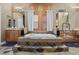 Bathroom with a large soaking tub on a raised platform, double vanities and tile flooring at 51 Avenida Sorrento, Henderson, NV 89011