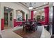 Elegant dining room with seating for six, modern lighting, and stylish decor; perfect for entertaining at 51 Avenida Sorrento, Henderson, NV 89011