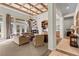 A spacious living room featuring high ceilings, fireplace and hardwood flooring at 51 Avenida Sorrento, Henderson, NV 89011