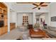 Comfortable living room featuring an open floor plan, built-in cabinetry, and neutral decor at 51 Avenida Sorrento, Henderson, NV 89011