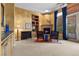 Inviting main bedroom showcasing a fireplace, sitting area, and access to the outdoors at 51 Avenida Sorrento, Henderson, NV 89011