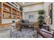 Well-appointed office with custom built-ins, ample desk space, and neutral decor for a productive atmosphere at 51 Avenida Sorrento, Henderson, NV 89011