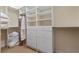 Spacious walk-in closet features custom shelving, drawers, and ample storage for clothes and linens at 51 Avenida Sorrento, Henderson, NV 89011