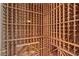 Custom wine cellar featuring wooden racking system at 51 Avenida Sorrento, Henderson, NV 89011
