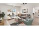 Cozy living room with modern furnishings and seamless access to a private backyard patio at 6205 Hargrove Ave, Las Vegas, NV 89107