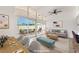 Bright living room featuring an open floor plan and large glass doors leading to an outdoor patio at 6205 Hargrove Ave, Las Vegas, NV 89107