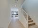 Hallway with a view of the kitchen and a staircase at 6442 Kobe Knoll Ct, Las Vegas, NV 89141