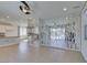 Spacious kitchen with granite countertops, stainless appliances, and decorative privacy wall at 6442 Kobe Knoll Ct, Las Vegas, NV 89141