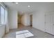 Bright living room featuring tile floors, natural light, and neutral color palette at 6442 Kobe Knoll Ct, Las Vegas, NV 89141