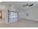 Open concept living room with decorative privacy wall and tile flooring at 6442 Kobe Knoll Ct, Las Vegas, NV 89141