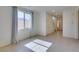 Bright living room featuring tile floors, natural light, and neutral color palette at 6442 Kobe Knoll Ct, Las Vegas, NV 89141