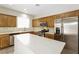 Kitchen featuring stainless steel appliances, island, and ample cabinet space at 6591 Gertrude Ct, Las Vegas, NV 89141