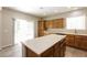 Spacious kitchen features a central island, stainless dishwasher, and pantry at 6591 Gertrude Ct, Las Vegas, NV 89141