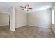 Spacious living room with a ceiling fan and view to the hallway at 6591 Gertrude Ct, Las Vegas, NV 89141
