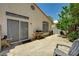 Patio area with sliding glass doors, a grill, and low-maintenance landscaping at 7616 Yondering Ave, Las Vegas, NV 89131