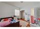 Bedroom featuring wood floor, closet space and decor at 7616 Yondering Ave, Las Vegas, NV 89131