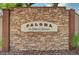 Stone community sign for Paloma at Elkhorn Springs in a desert landscape, welcoming residents and visitors at 7616 Yondering Ave, Las Vegas, NV 89131