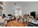 Home office features hardwood floors, a window and desk at 7616 Yondering Ave, Las Vegas, NV 89131