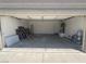Spacious garage with painted walls and room for storage or workbench at 8068 Cetus Cir, Las Vegas, NV 89128