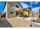 Spacious backyard featuring a covered patio area and easy landscaping at 8295 Nebula Cloud Ave, Las Vegas, NV 89131