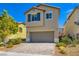 Charming two-story home with a landscaped yard and a two-car garage at 8295 Nebula Cloud Ave, Las Vegas, NV 89131